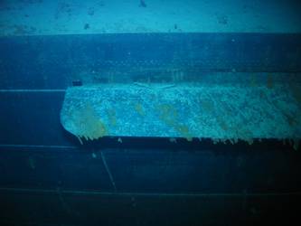 Concealment flap for above-water torpedo tubes on stbd side
